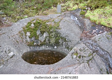 A giant's kettle, also known as either a giant's cauldron, is a typically large and cylindrical pothole drilled in solid rock underlying a glacier.