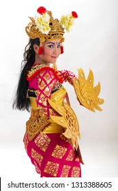 Gianyar, Bali / Indonesia - August 2012 : Portrait of  Balinese Woman Dancer. Balinese traditional dress isolated with white background.