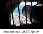 Gibraltar Cannon From Caves Looking Out to Water