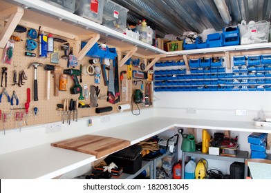 Gibraltar, Gibraltar,11 January 2011; A workshop area in a home garage showing tools and DIY equipment in storage boxes and hanging on hooks