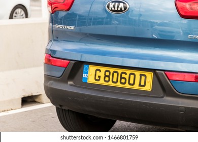 GIBRALTAR, UK - Dec 29, 2017: A Gibraltar yellow car plate on a KIA blue car