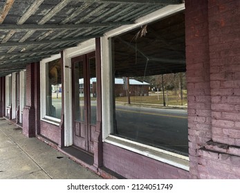 Gibson, Ga USA - 01 10 22: Small Town USA Downtown Gibson Georgia Large Windows Vintage Strip Mall