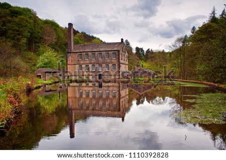 Gibson Mill in the tranquil woodland setting of Hardcastle Crags