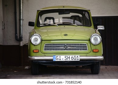 GIESSEN, GERMANY - SEPTEMBER 30: The Front View Of An Old Vintage Car From The Trabant Brand In A Parking Lot On September 30, 2017 In Giessen / Vintage Car Trabant