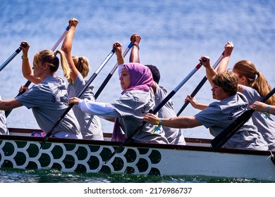 Gifhorn, Germany, July 10, 2022: Multicultural Diverse Team With Rowers Of Different Ethnicities At Dragon Boat Race