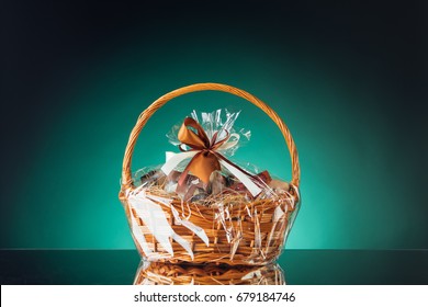 Gift Basket On Emerald Background Stock Photo 679184746 | Shutterstock