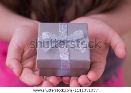 gift box in children's hands