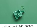 Gift box with clover for St. Patrick