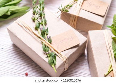 Gift box decorated with thyme branch - Shutterstock ID 1120018676