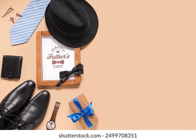 Gift box, greeting card with text HAPPY FATHER'S DAY and man's accessories on yellow background. Top view - Powered by Shutterstock