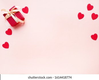 Gift box and hearts on pink background. Saint Valentine's day. - Shutterstock ID 1614418774