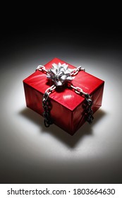 Gift Box Locked In Chain With A Silver Ribbon. Decorative Background Design 