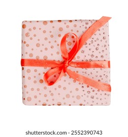 Gift box with pink polka dot wrapping and red ribbon. Pink gift box, red ribbon, polka dots. Festive gift box, pink and red, perfect for celebrations. Birthday element isolated on white background. - Powered by Shutterstock