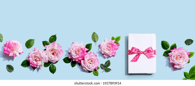 Gift Box With Pink Roses Overhead View - Flat Lay