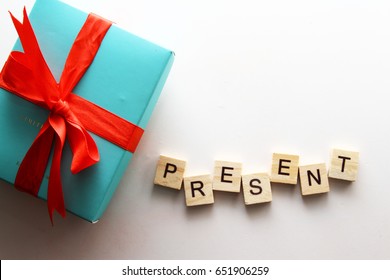 Gift box /. A gift or a present is an item given to someone without the expectation of payment or return.