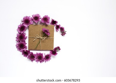 Gift box with string on white background
