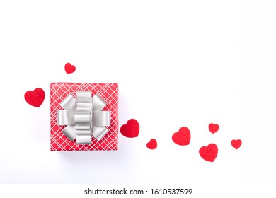 The gift box was wrapped in red and white striped wrapping paper isolated on a white background. Top view
Happy birthday or Valentine day  - Powered by Shutterstock