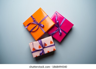 Gift boxes collection for Christmas. Wrapping colorful gift boxes on pastel color background with copy space - Shutterstock ID 1868494540