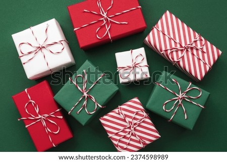 Gift boxes on color background, flat lay