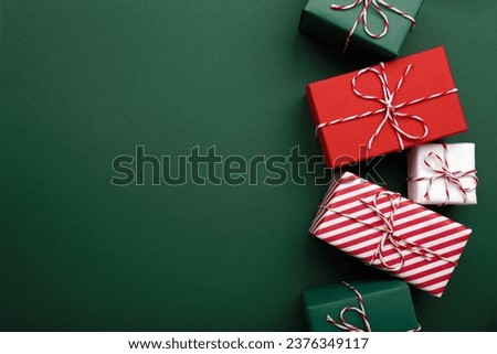 Gift boxes on color background, flat lay.