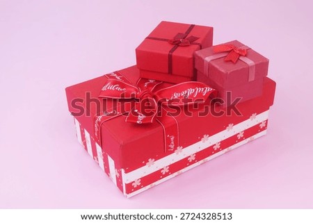 Gift boxes on pink background. Birthday and resent concept.