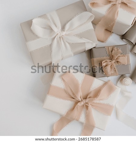 Gift boxes packaging on white background. Festive Christmas, New Year holidays celebration concept. Flat lay, top view