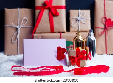 Gift boxes and perfume with envelope for christmas or Saint Valentine Day holiday