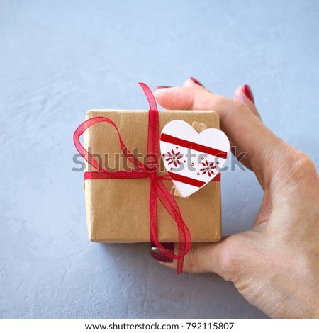 Similar – Foto Bild Weiße Geschenkbox mit Aufkleber auf Holztisch.