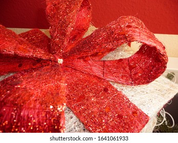 The Gift Has A Large Red Bow