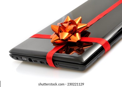 Gift Laptop On The White Background