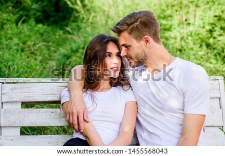 gift of love. valentines day. summer camping in wood. family rancho weekend. romantic date. man with girl in park. couple relax outdoor on bench. Togetherness concept. couple in love. Casual fashion.