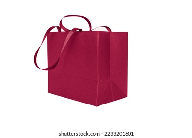 Gift paper bag, shopping bag in Viva Magenta color isolated on white background. Mocr up of blank craft package. Concept for presents holidays, father's day. High quality photo - Shutterstock ID 2233201601