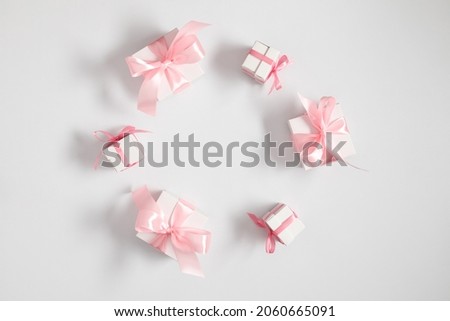 Gift or present box on gray table. White background mockup with gifts. Flat lay, top view, copy space
