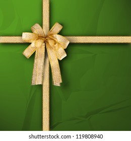 Gift And Present Wrapping Box With Gold Ribbon And Green Paper