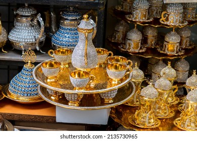Gift tea and coffee sets decorated with fake diamonds. SPice Bazaar or grand Bazaar, İstanbul. selective Focus
