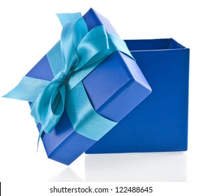 Gift Wrapped Present Box With Blue Satin Bow Close Up Isolated On White Background