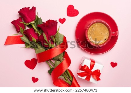 Gifts and coffee for valentines day on color background, top view