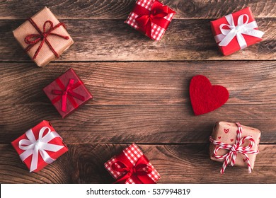  Gifts And Felt Heart On Wooden Background. Valentine's Background. Flat Lay. View From Above. Valentines Day.