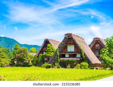 Gifu Prefecture, Japan: Farm houses with very unique thatched roof under the blue sky. The historical village of Shirakawa-go.