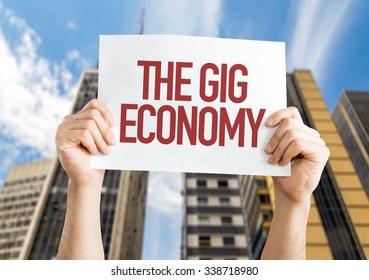 The GIG Economy Placard With Urban Background