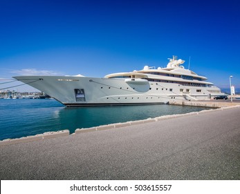 Gigantic Big And Large Luxury Mega Or Super Motor Yacht At Dock