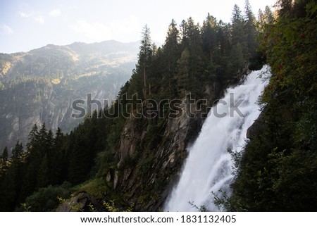 Gigantic masses of water at the "Krimmler Waterfalls" in the sunshine