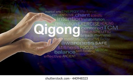 Gigong word cloud and healing hands - female cupped hands with the word QIGONG between surrounded by word cloud on a multicolored light centered dark background