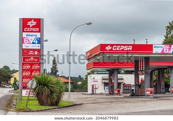 GIJON, SPAIN - Aug 27, 2021: CEPSA gas station\
front store shop of the brand with sign, logo signage and copy\
space in Spain