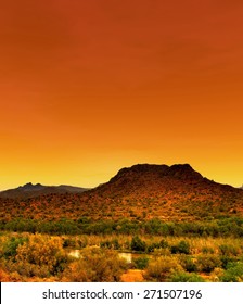 Gila River In Arizona With Orange Sunset