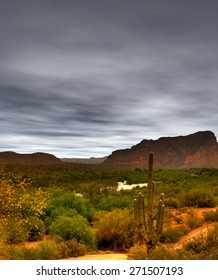 Gila River Arizona Reflection And Building Storm