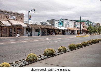 GILBERT, AZ - JUNE 12, 2020: Businesses Along Road In Downtown Gilbert Arizona. Foreground Sidewalk