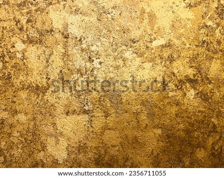 Gild texture on gold buddha statue background, Which Buddhist people use to worship The sacred.