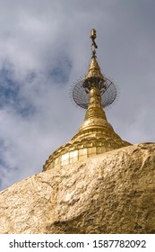 Gilded Stupa On Top Of The Golden Rock Temple At Mt. Kyaiktiyo, Myanmar. Kyaiktiyo Pagoda Is One Of The Most Famous Buddhist Pilgrimage Sites In Myanmar.