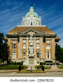 Giles County Courthouse In Pulaski, Tennessee With Sam Davis Monument In Foreground.